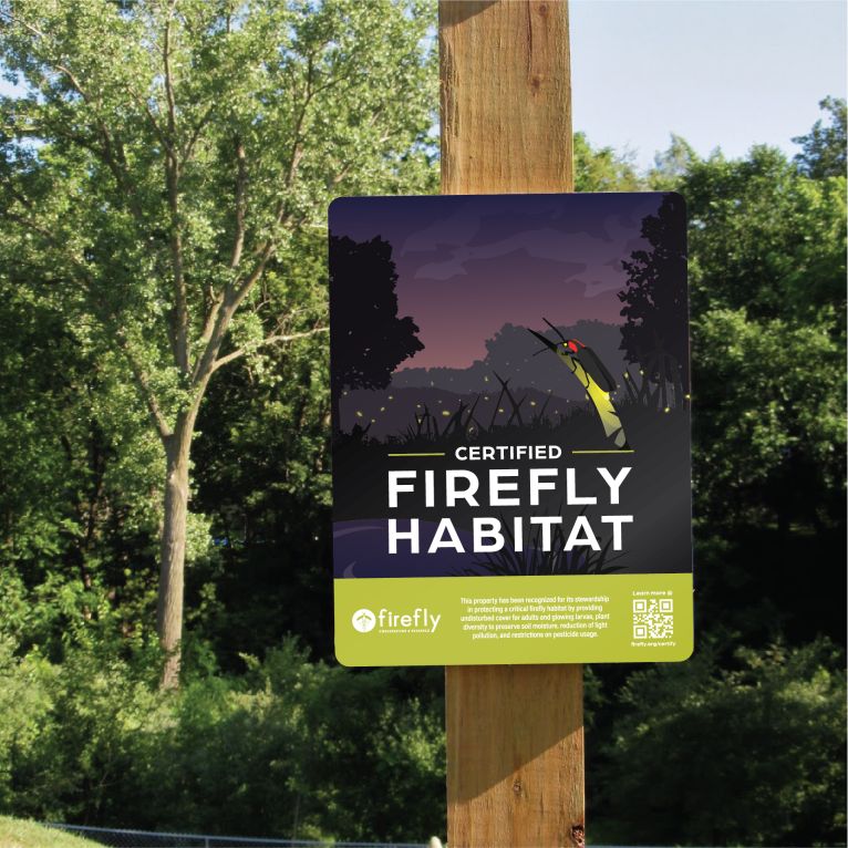 Picture of Certified Firefly Habitat Sign on Wooden Post Outside